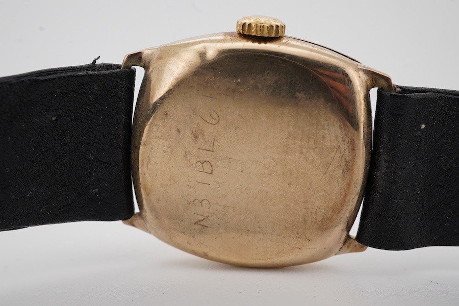 A gentleman's George V yellow metal Longines manual wind, with Arabic dial and subsidiary seconds, cased diameter 30mm, on a later associated leather strap. Condition - fair